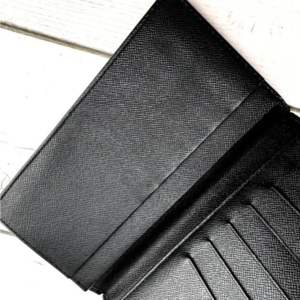 AUTHENTIC Louis Vuitton Monogram Porte Valeurs Checkbook Wallet. Color: Black